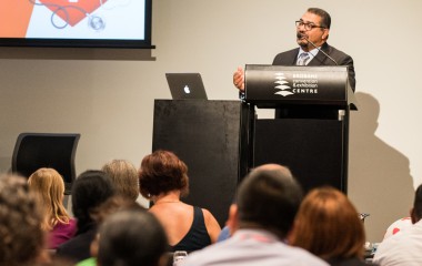 Dr El Gamel presenting at the RHDAustralia Close The Gap Breakfast